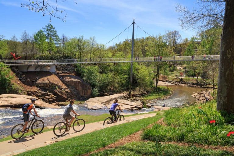 Greenville Swamp Rabbit Trail with Liberty Bridge in the background.