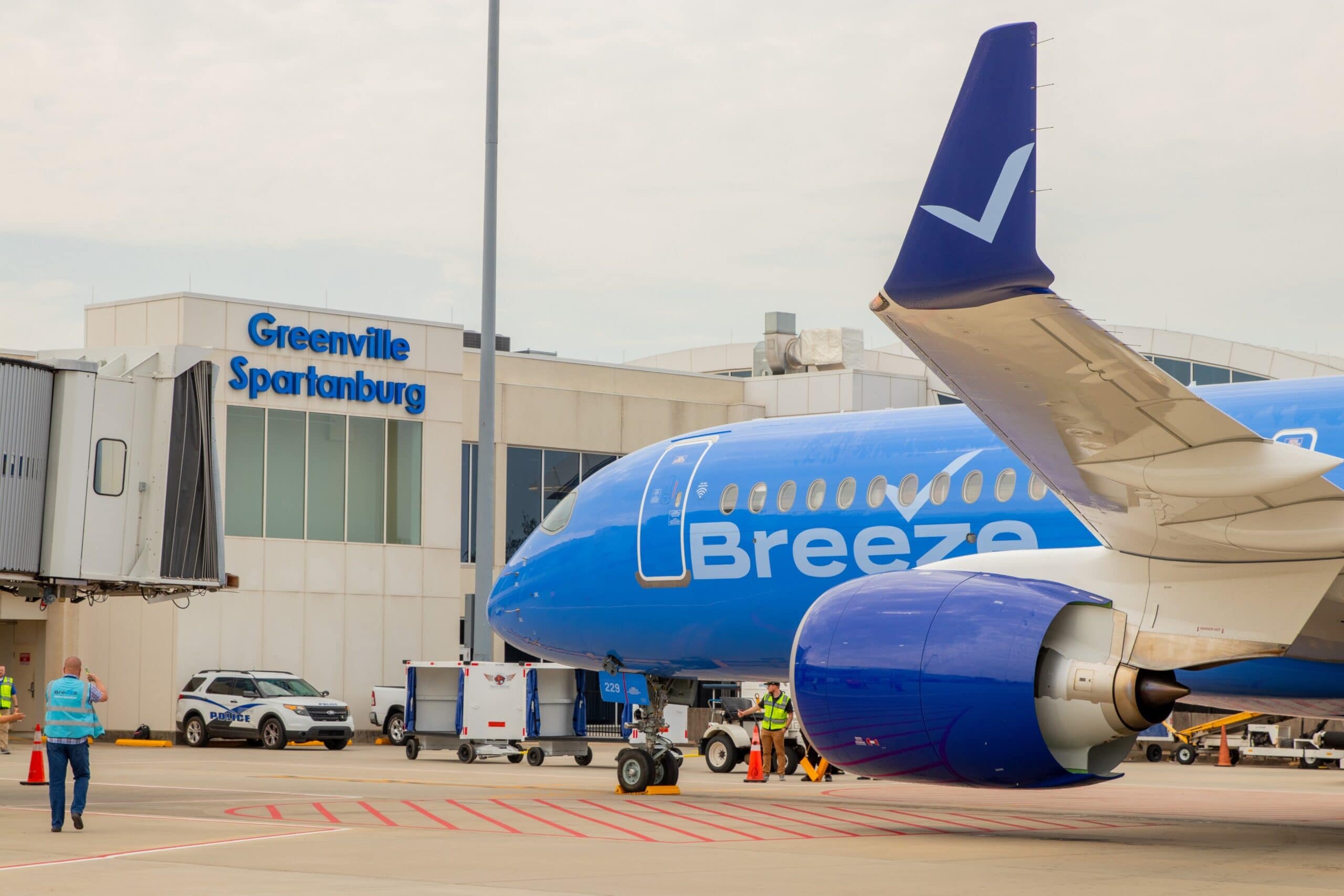 Breeze aircraft parked at gate at Greenville-Spartanburg Airport.