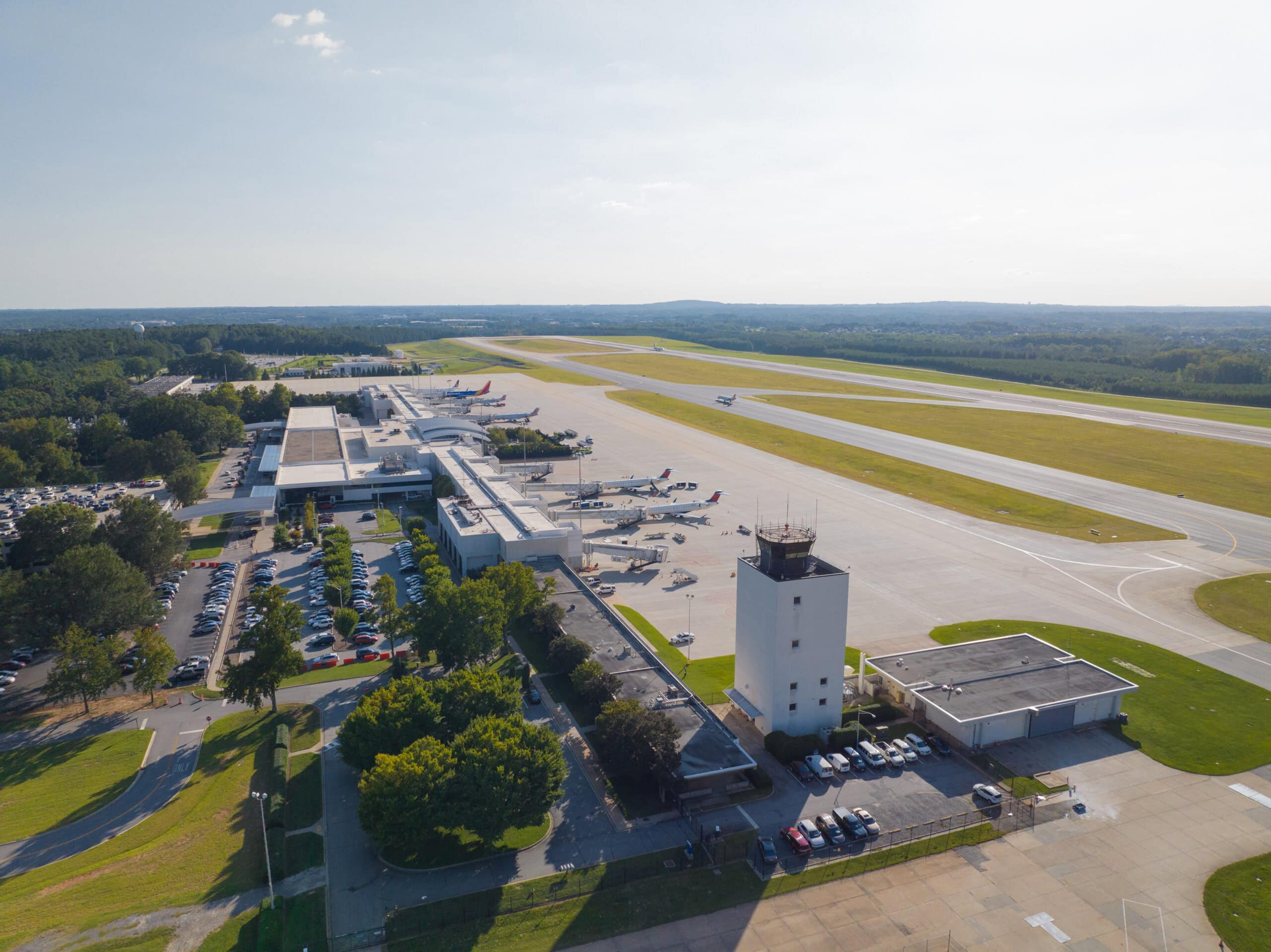 Aerial photo of the airport terminal and airfield.